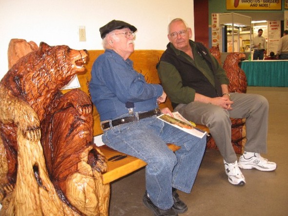 Bob Gerding visits with a guest at his annual show. 