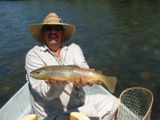 The author, Karl Moffatt, shows off a nice Brown trout caught in the lower San Juan River during a July 2010 trip.