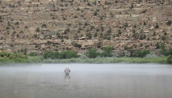 An angler in the mist on the San Juan River in northwestern New Mexico.