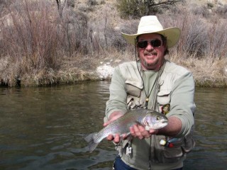 The author shows of a nice San Juan River trout.