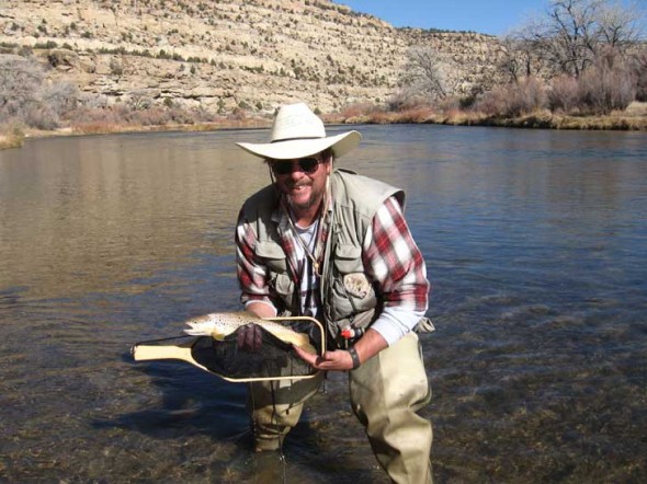 Author Karl F. Moffatt with a nice Brown Trout caught at Simon Canyon on the San Juan River in November 2008. Special thanks to David McGee of Roswell for taking the photo.