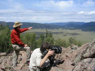 National Park Service Cinematographer, John Grabowska, directs a shot of the Valles Caldera during filming for Bandelier.