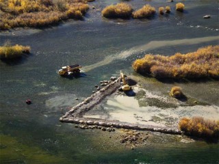 Construction Equipment work in the Braids section of the San Juan River.