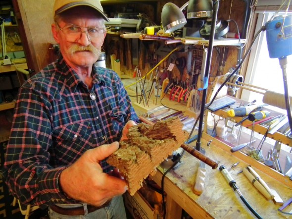 Bruce Smith shows off the kind of wood that can be used to create  a custom rod handle. 