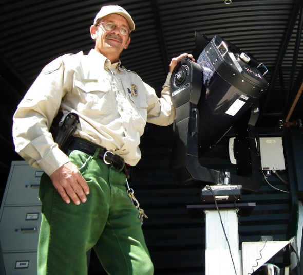 Clayton State park Manager, Charles Jordan, shows off the park observatory's 12-inch Meade computer operated telescope.