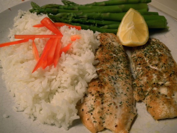 Broiled, seasoned  salmon, steamed white rice and asparagus make for a great meal.