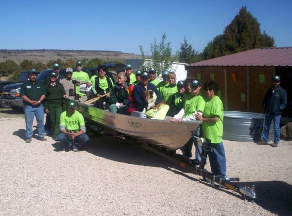 Group photo with boat at Clayton Lake State Park NM 